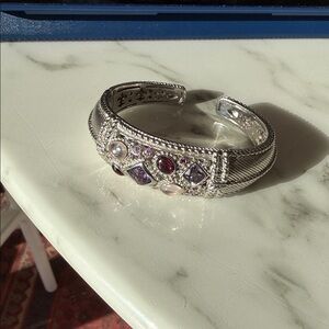Judith Ripka Sterling silver pink/purple multi-gemstone cuff bangle.  7.5”